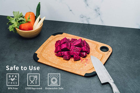 Toptier wood fiber cutting board shows built-in juice groove to catch liquids.