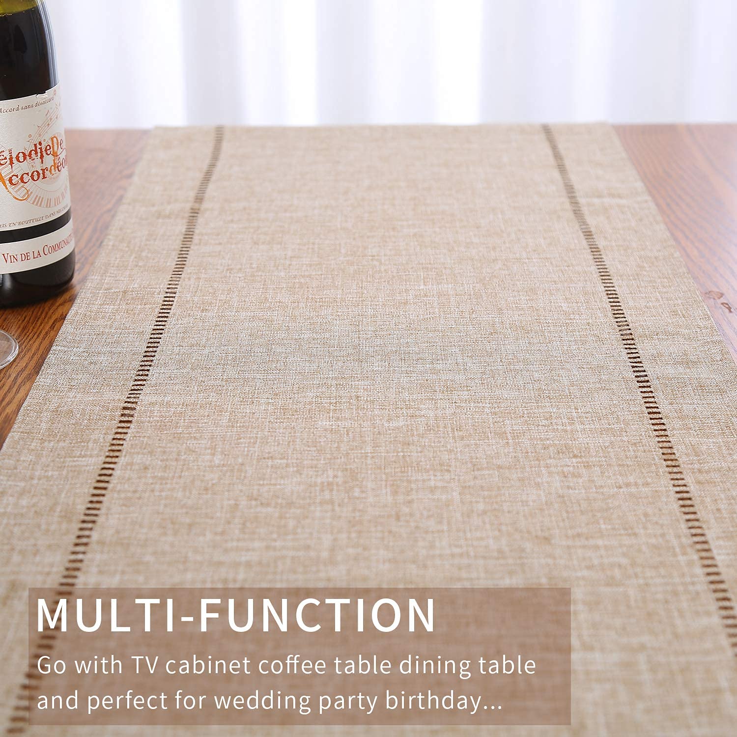 Tosewever table runner styled on a coffee table for warm decor.