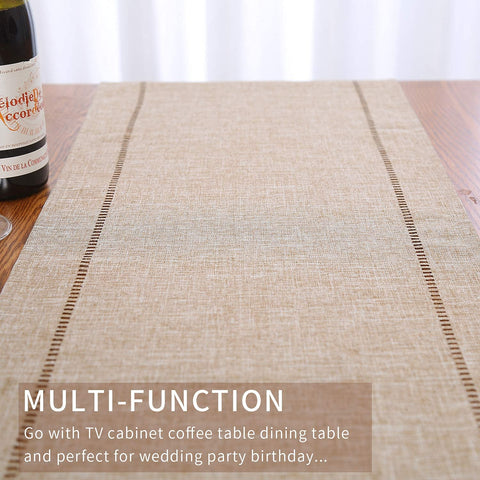 Tosewever table runner styled on a coffee table for warm decor.