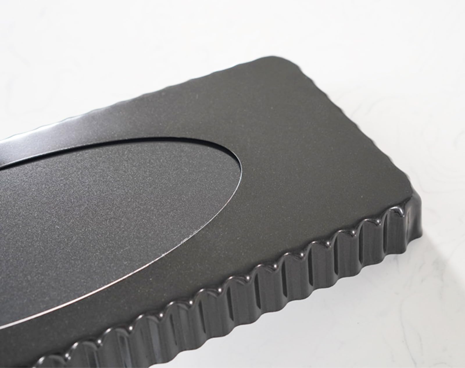 Tosnail quiche pan ideal for quiche, tart, or pie dishes.