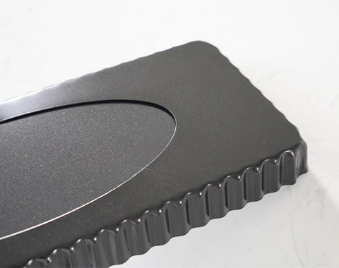 Tosnail quiche pan ideal for quiche, tart, or pie dishes.