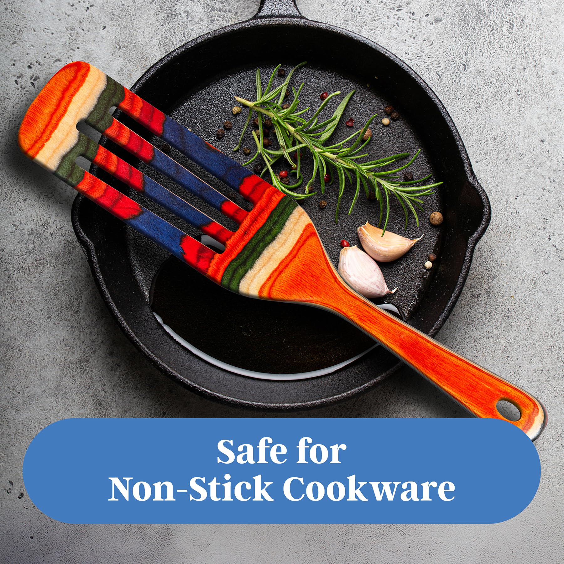 13in Baltique spurtle reaches deep pots for thorough mixing and turning.