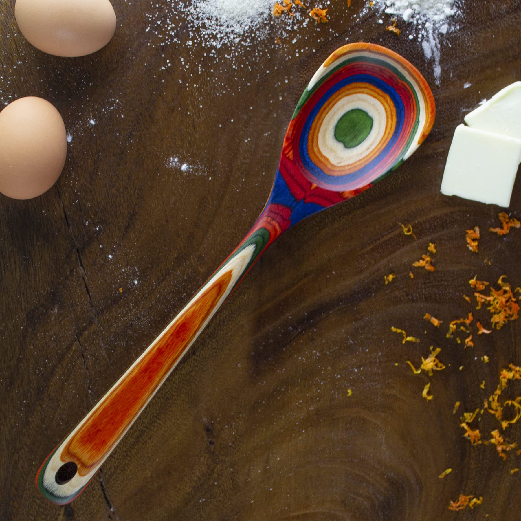 Baltique Marrakesh spoon shows rainbow birch layers for vibrant mixing and serving.