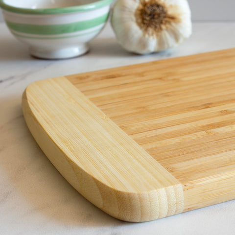 Totally Bamboo Hana cutting board knife-friendly surface to protect blades.