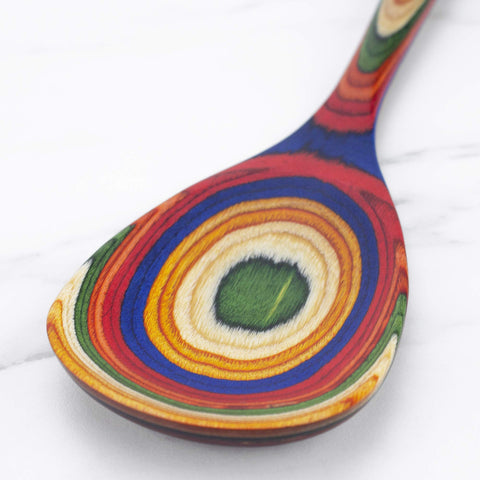 Baltique Marrakesh spoon being wiped with a damp cloth after use.