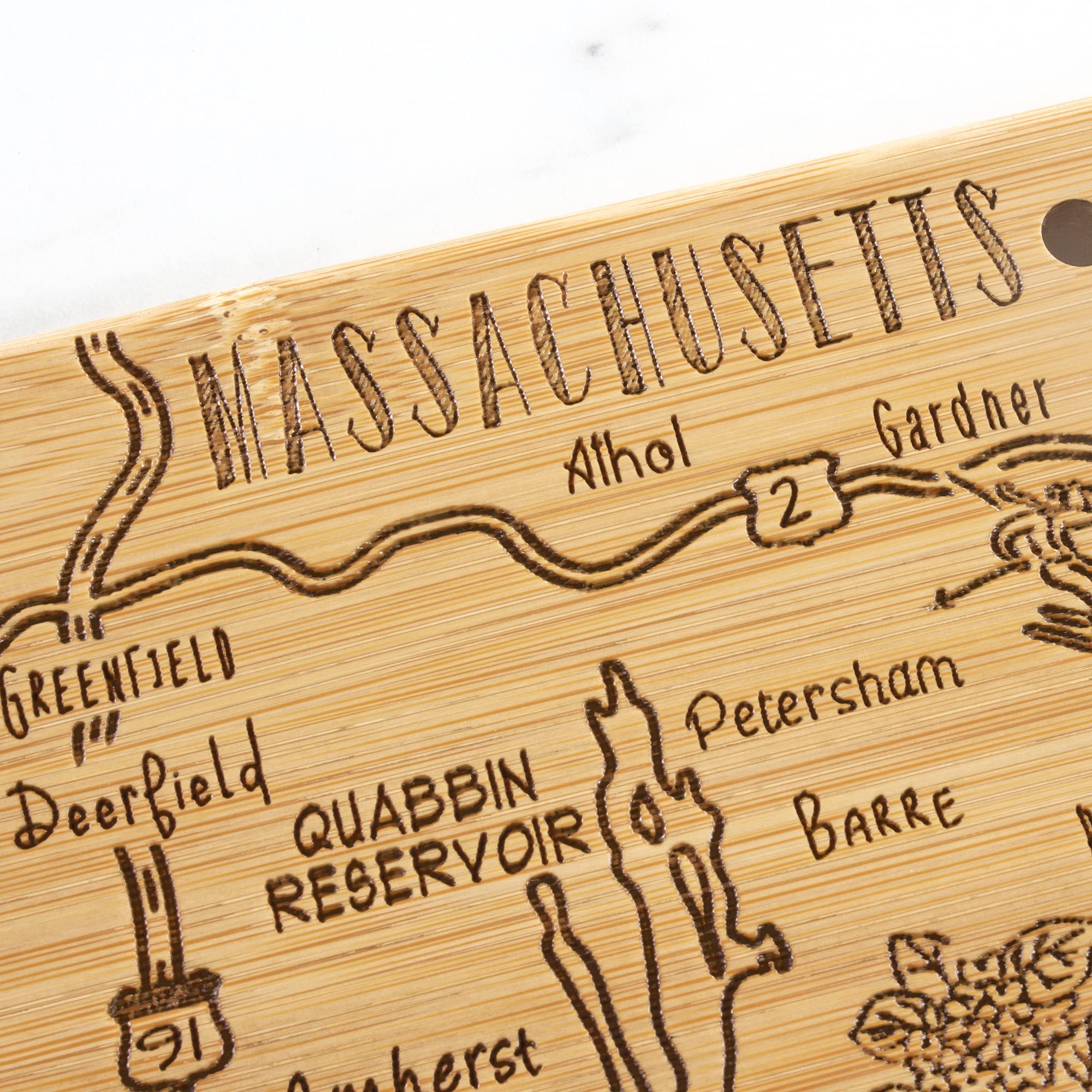 Totally Bamboo knife-friendly surface protects blades during prep and serving.