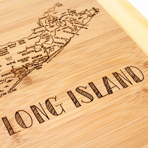 Totally Bamboo dual-sided board offers knife-friendly cutting and stylish serving.