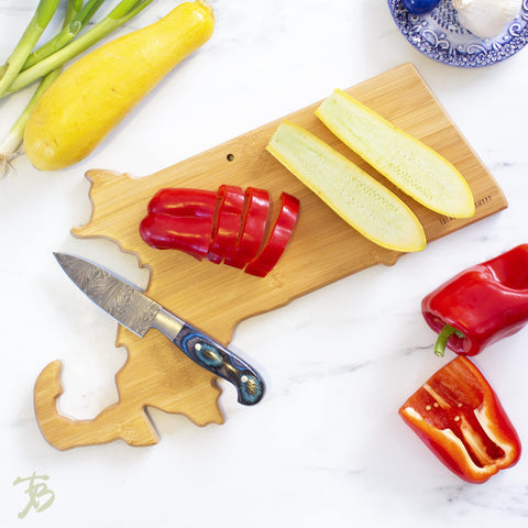 Totally Bamboo serving board doubles as a knife-friendly cutting surface.
