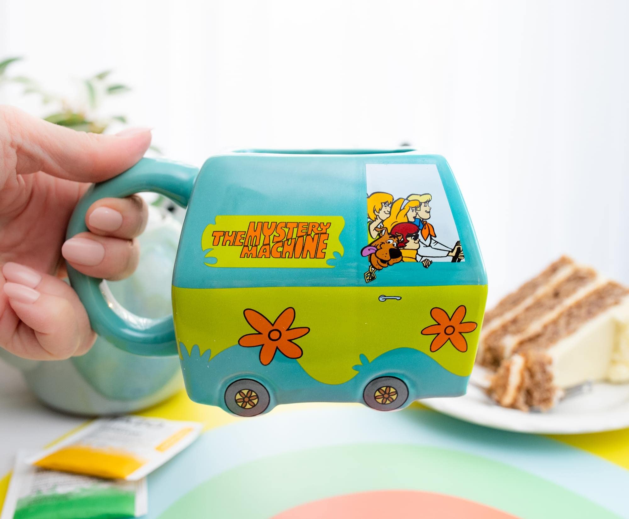Toynk Scooby-Doo Mystery Inc crest mug adds playful collector appeal.