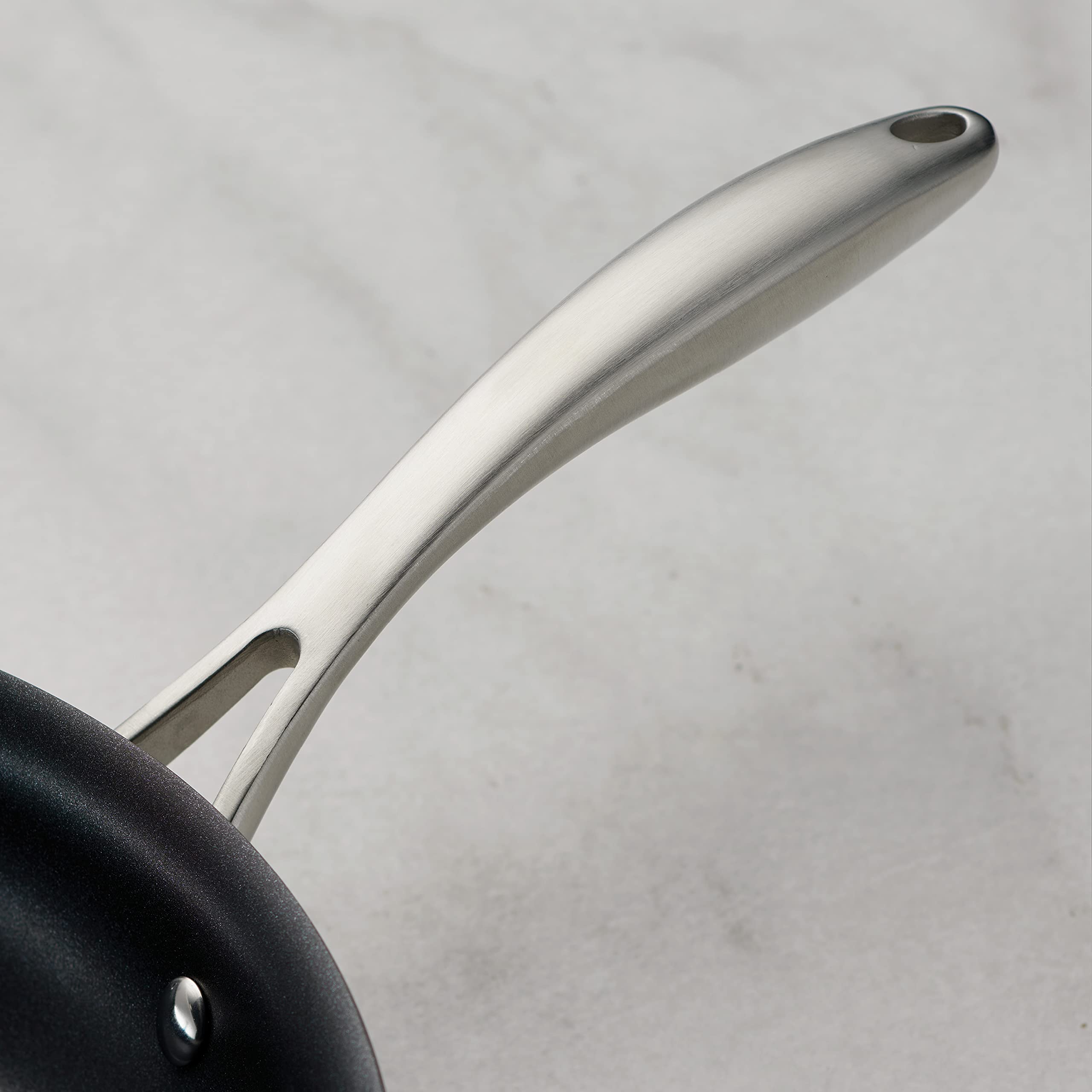 Tramontina OnyxPro 2-quart sauce pan with glass lid for precise simmering.