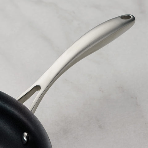 Tramontina OnyxPro 2-quart sauce pan with glass lid for precise simmering.