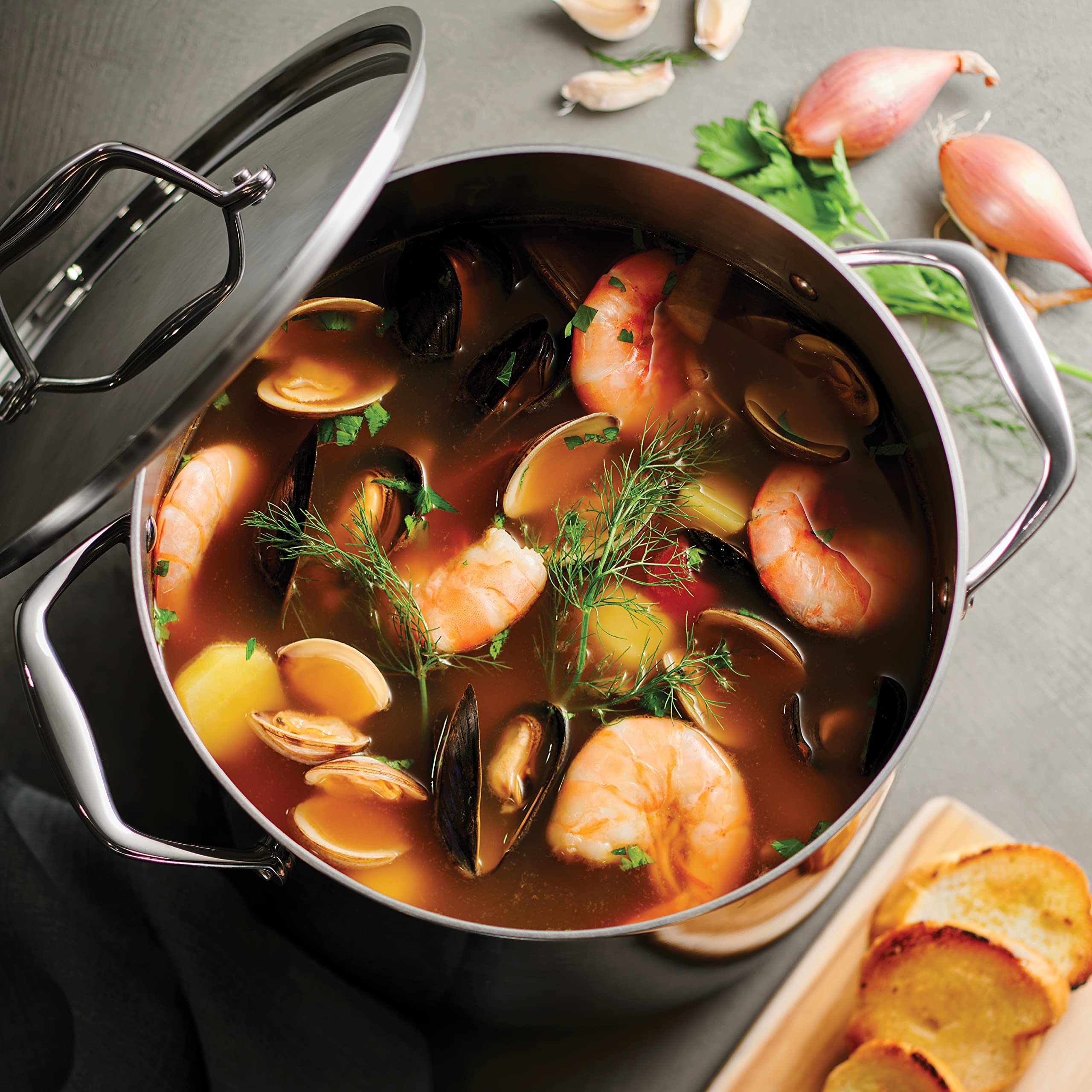 Tramontina Signature stock pot interior reveals tri-ply core for steady simmering.