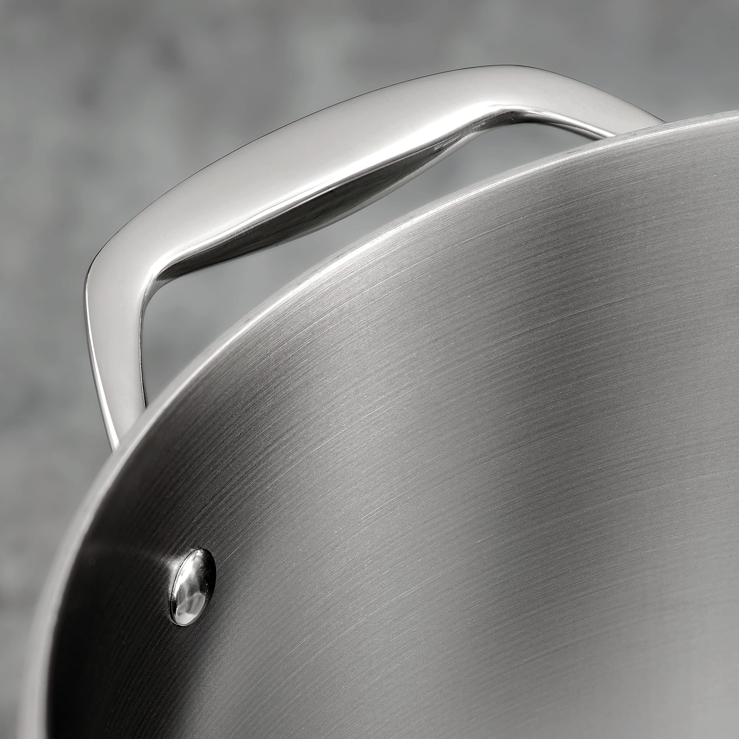 Lid closed on Tramontina braiser pan sealing moisture for flavorful results
