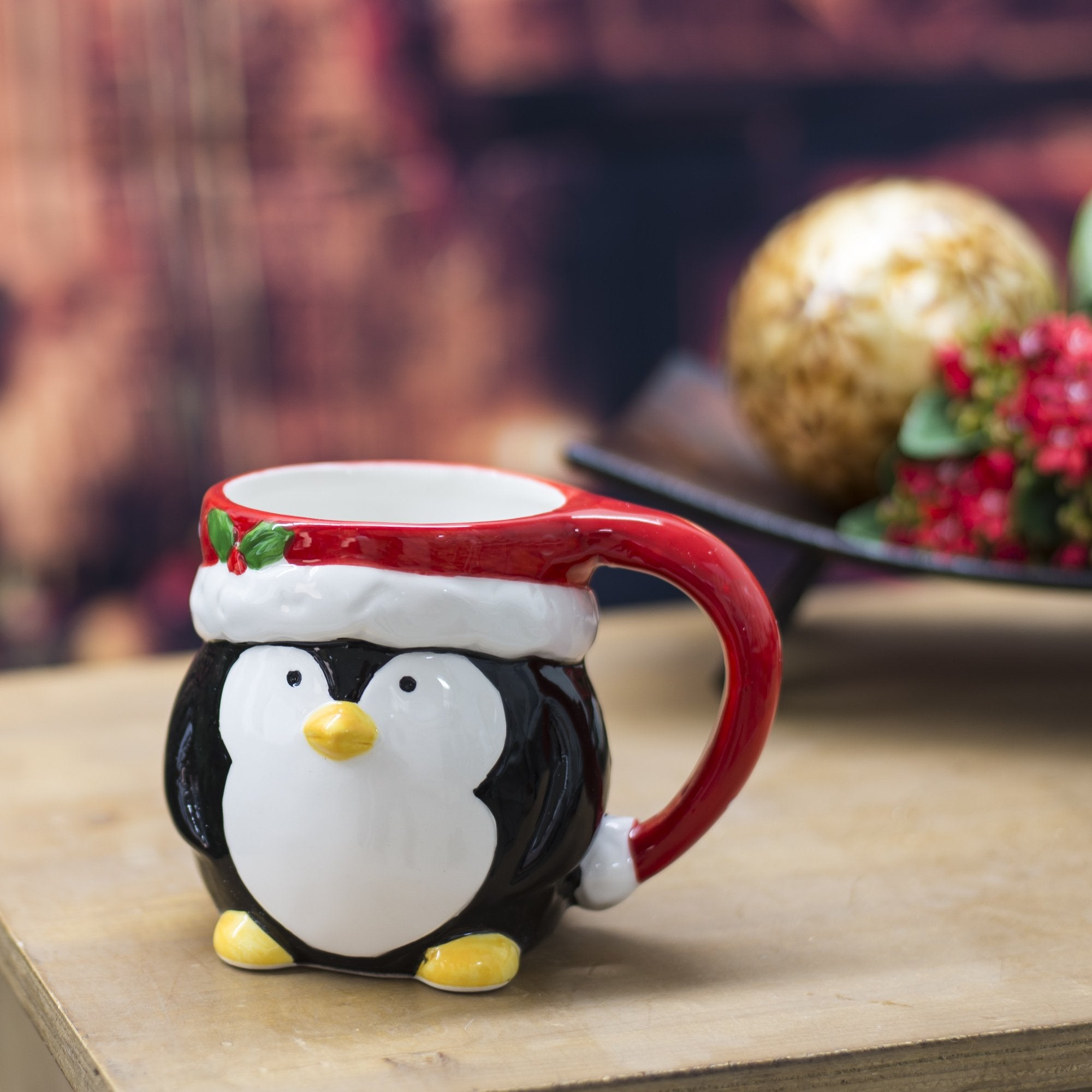 Transpac Penguin mug front view, charming Christmas design for cozy tea or cocoa rituals.