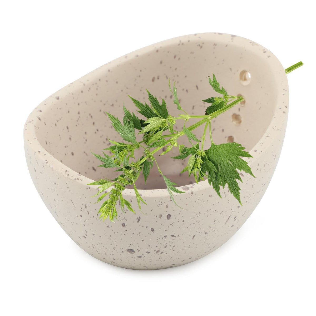 Trasylph Pottery Herb Stripper Bowl exterior view shows hole variety for fast herb prep.