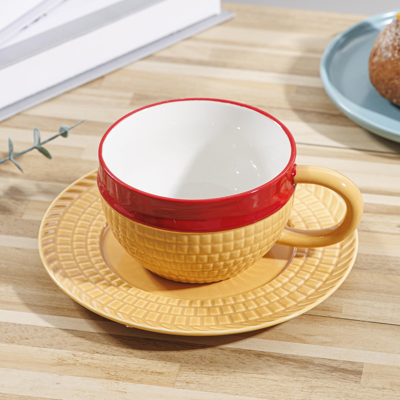 Tregoer mug and saucer set displayed on a desk, adding playful style to morning routine