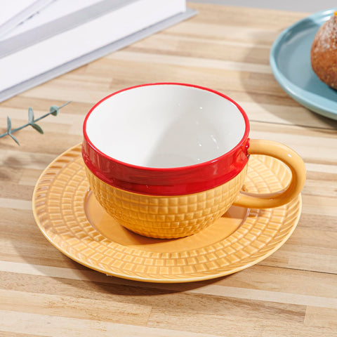 Tregoer mug and saucer set displayed on a desk, adding playful style to morning routine