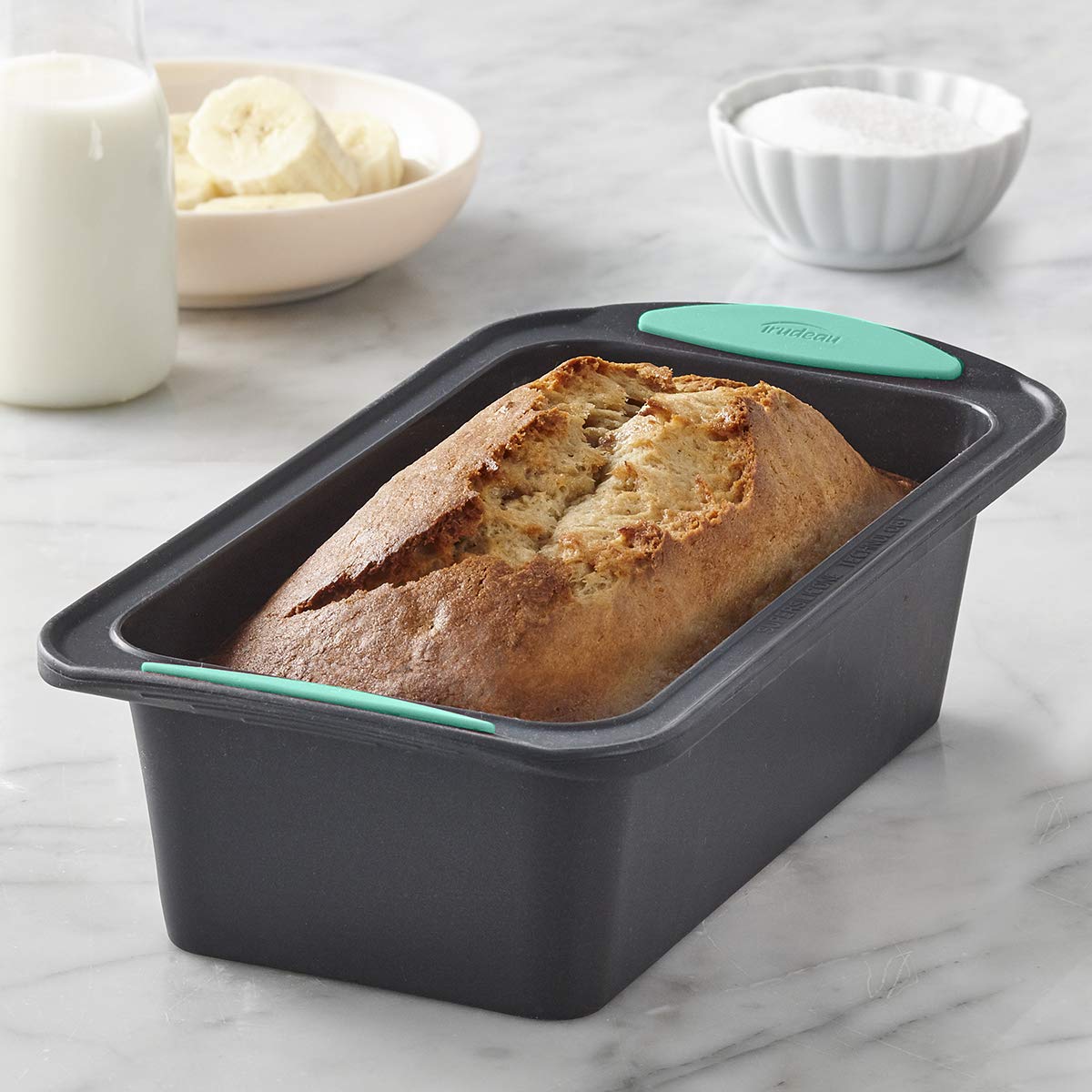 Trudeau loaf pan silicone release reduces sticking for clean, browning loaf every time.
