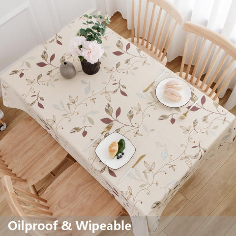 TruDelve beige wipe-clean tablecloth handles spills quickly during family dinners.