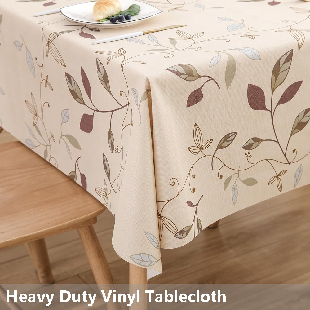 TruDelve beige vinyl tablecloth provides waterproof protection for rectangle dining tables.