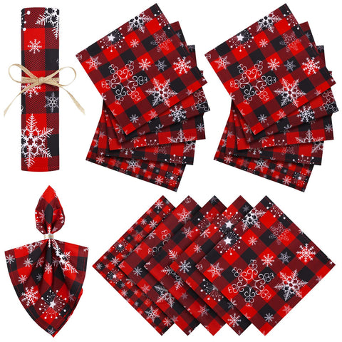 Tudomro Christmas napkins with snowflakes on buffalo plaid for festive table decor.