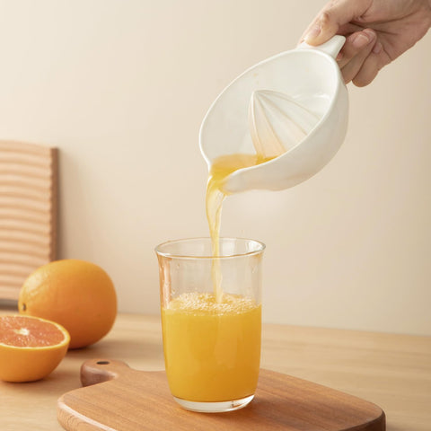 Tuioyoc ceramic juicer with non-slip base stays steady on the counter.