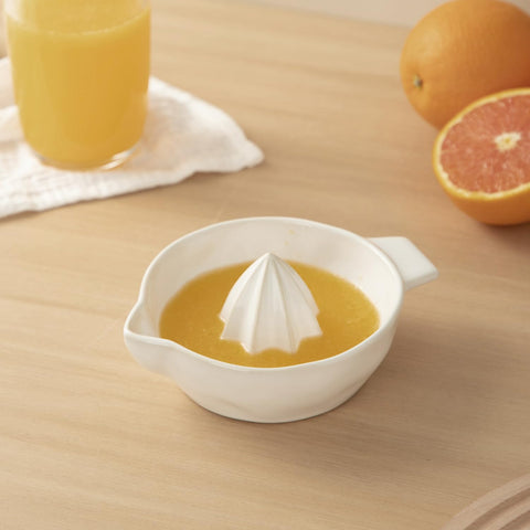 Tuioyoc compact lemon juicer fits small kitchens and drawers.