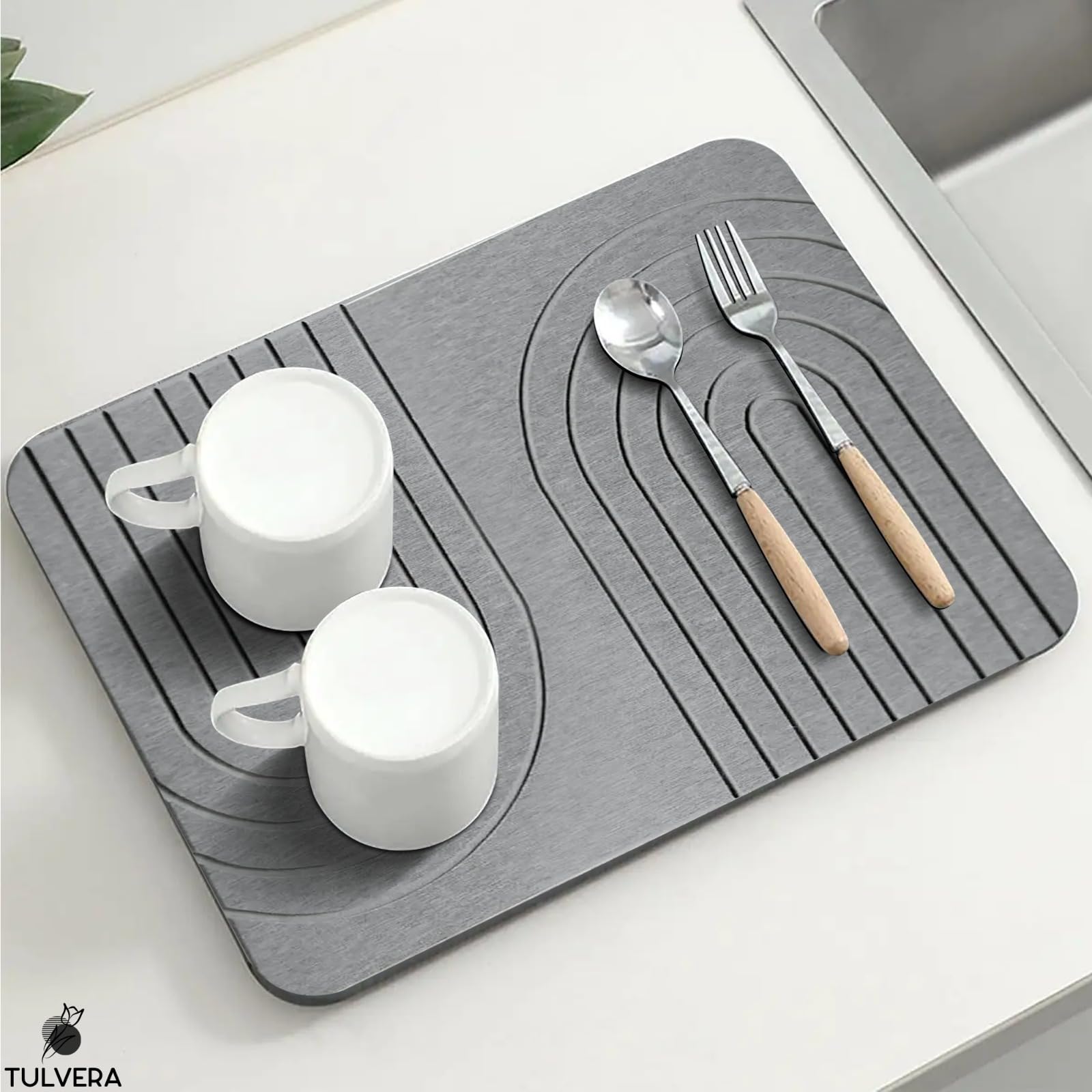 Tulvera stone dish drying mat rests on the counter for daily use