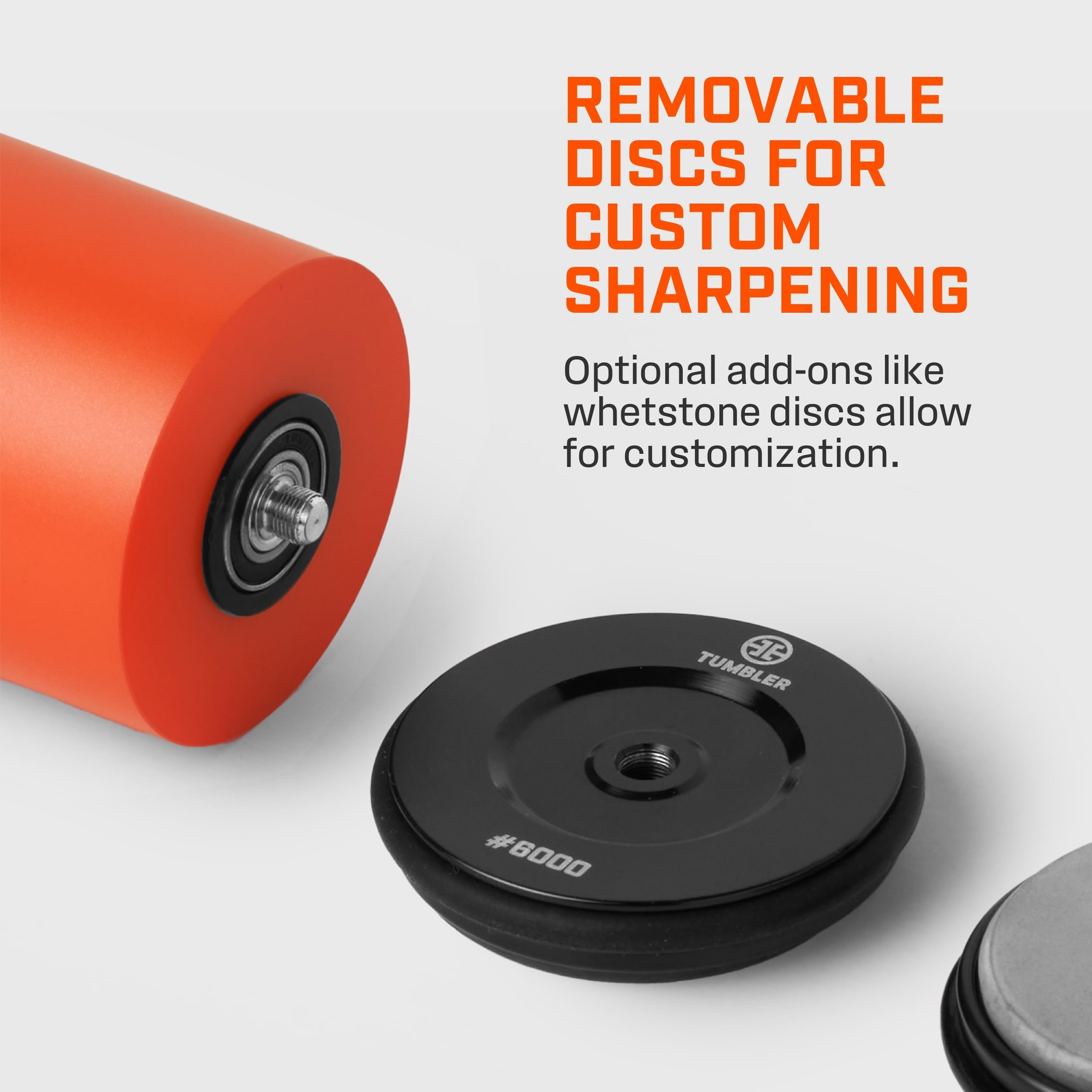 Tumbler Pro sharpener in use with a chef's knife demonstrating smooth sharpening motion.