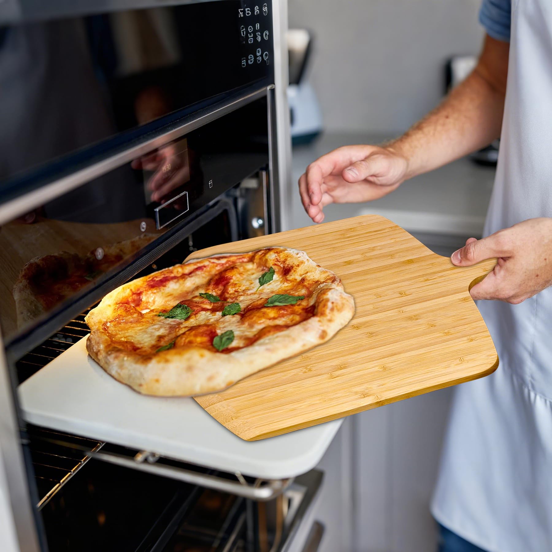 TUOCON pizza turning peel multifunction for pizzas and breads.