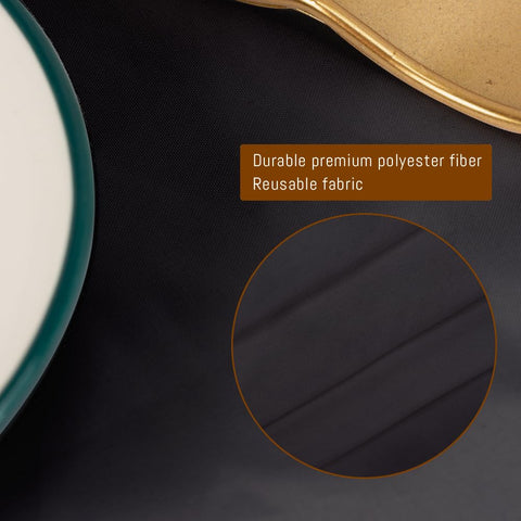Close-up of folded border on a TUOTPE tablecloth showing precise stitching quality.