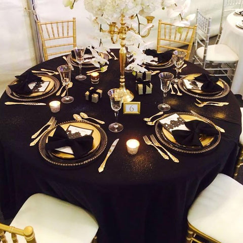 TUOTPE wedding setup using round tablecloths for a sleek banquet backdrop.