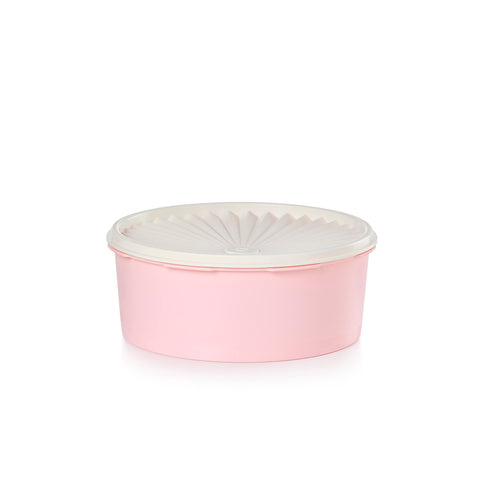 Tupperware Heritage cookie canister in vintage pink with airtight seal for freshness.