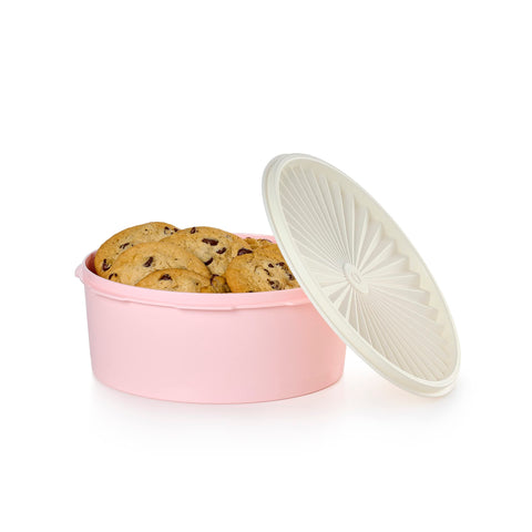 Tupperware Heritage canister on countertop display with retro charm.