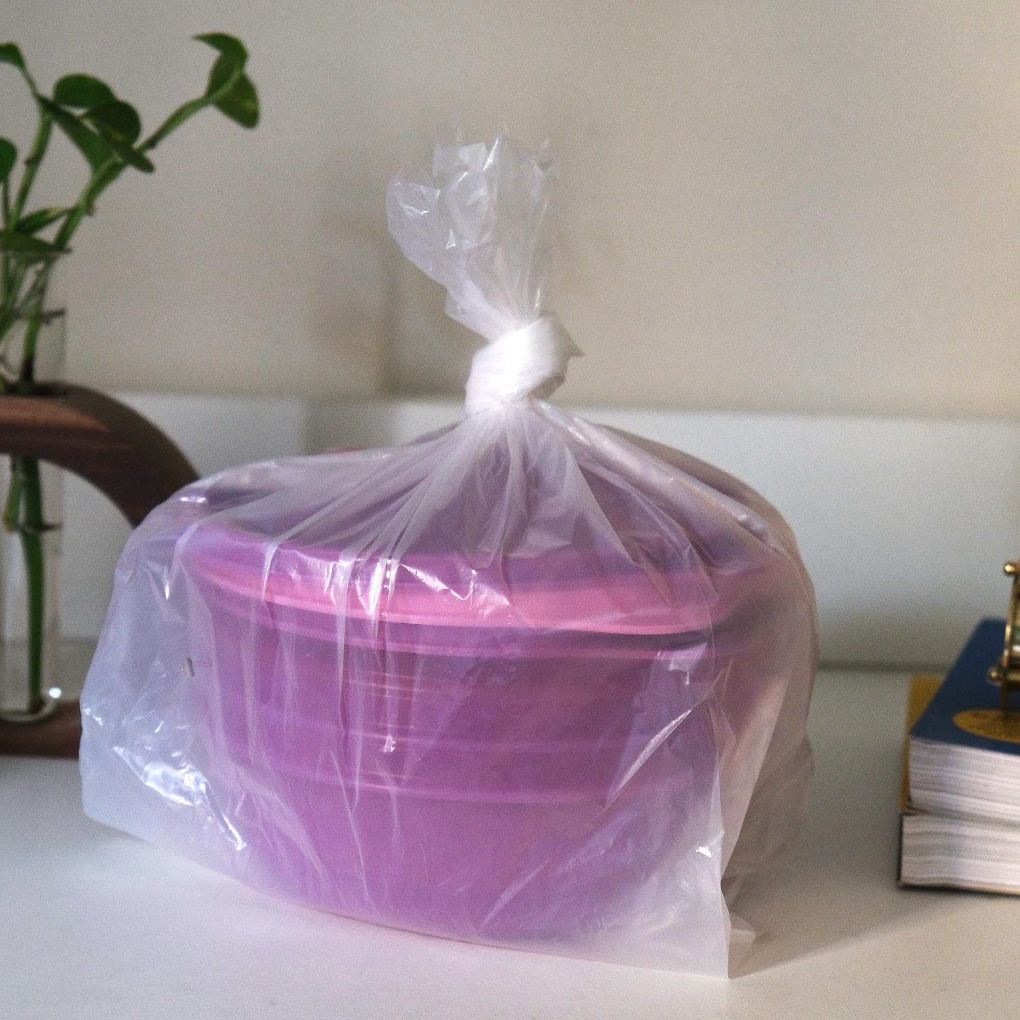 Tupperware color-coordinated pink and purple bowls for storage