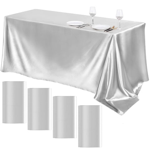 TURSTIN silver satin tablecloth 4-pack on a table adds elegant, event-ready shine for weddings.
