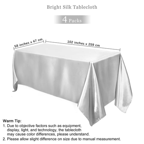 TURSTIN silver satin tablecloth drape closeup shows soft sheen and smooth draping for upscale dinners.
