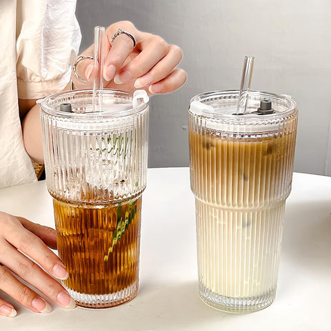 TUZAZO gift-ready glass cups with lids and straws for entertaining.