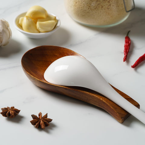 Tvvtuww decorative wooden spoon rest adds warm style to kitchen counters.