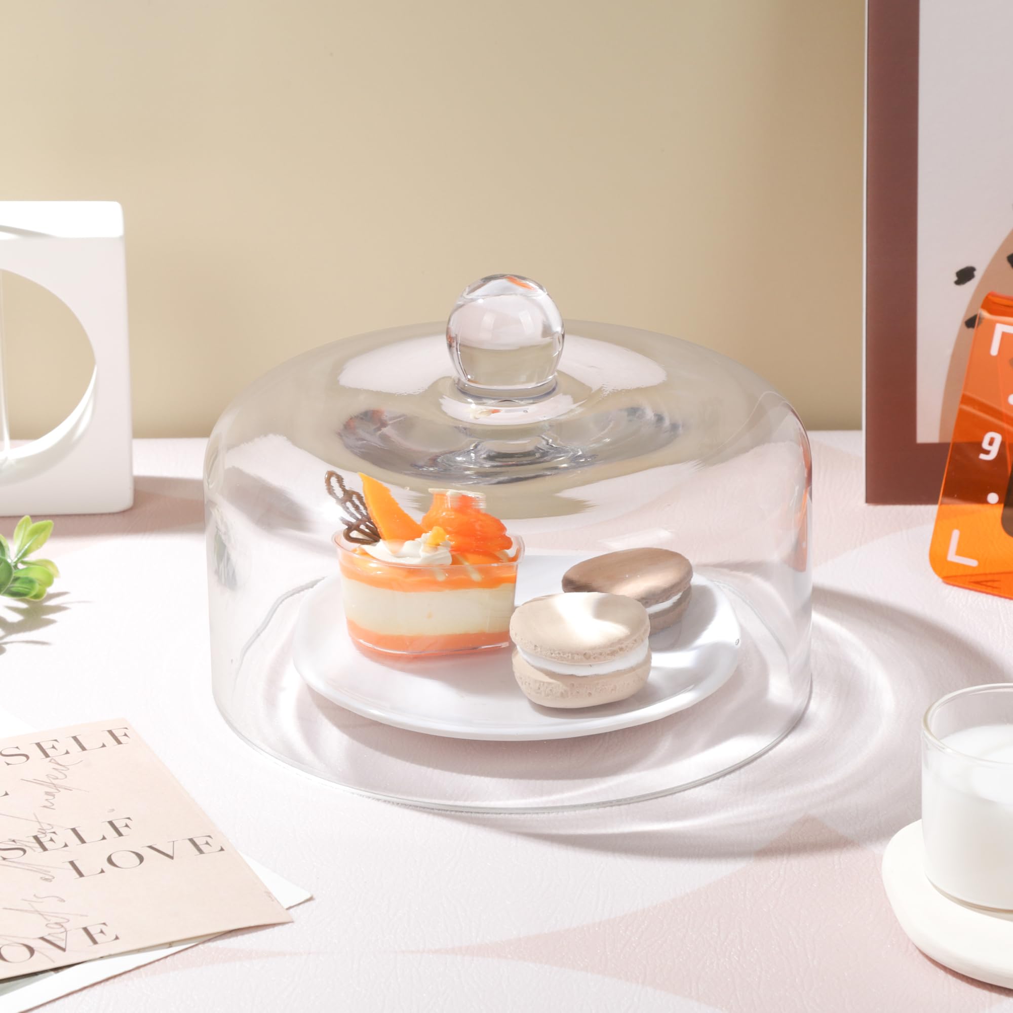 Twakutwaku cake stand topper with dome for a polished dessert presentation.