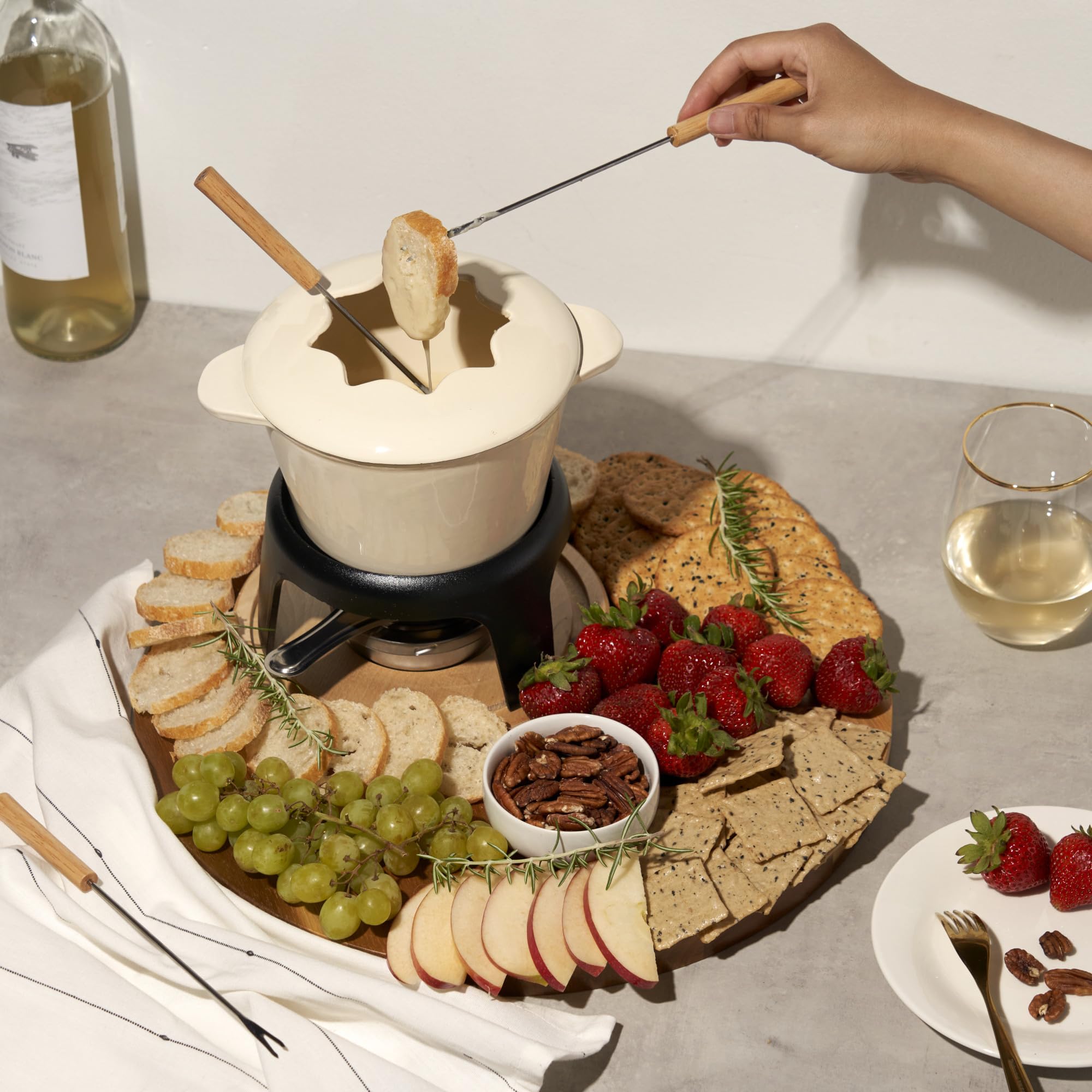 Twine cheese melting fondue creates rich, creamy dippers