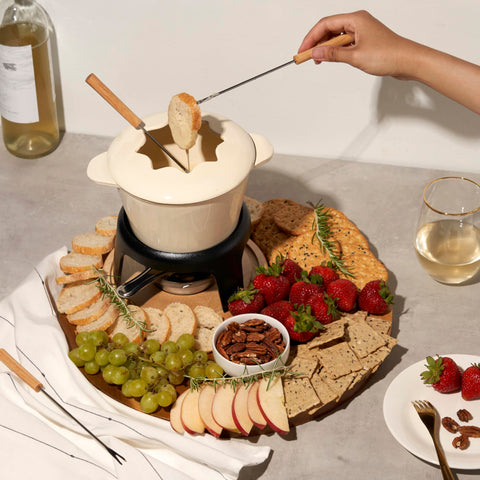 Twine cheese melting fondue creates rich, creamy dippers