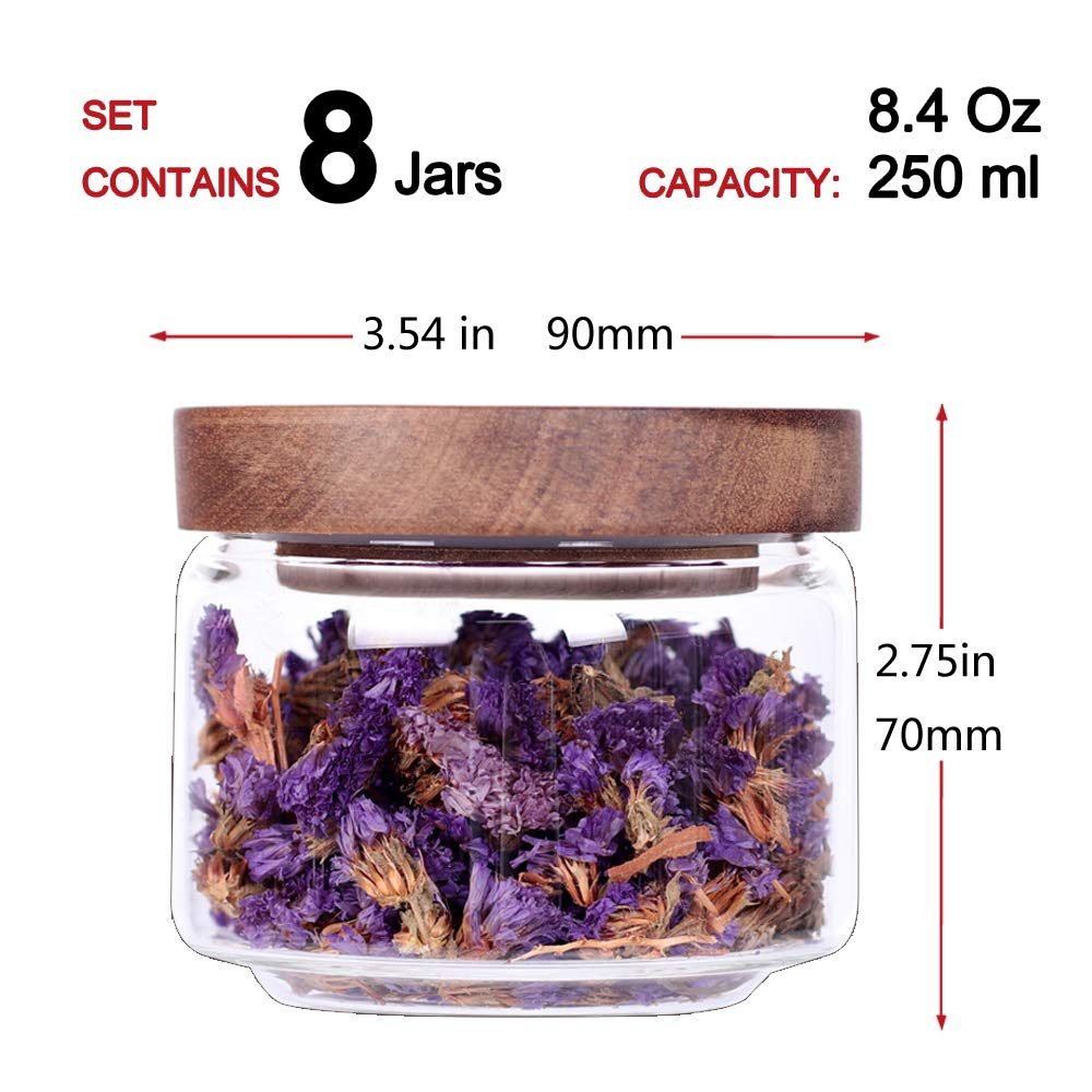 Tzerotone jars store salt, pepper, and dried herbs with clear visibility.