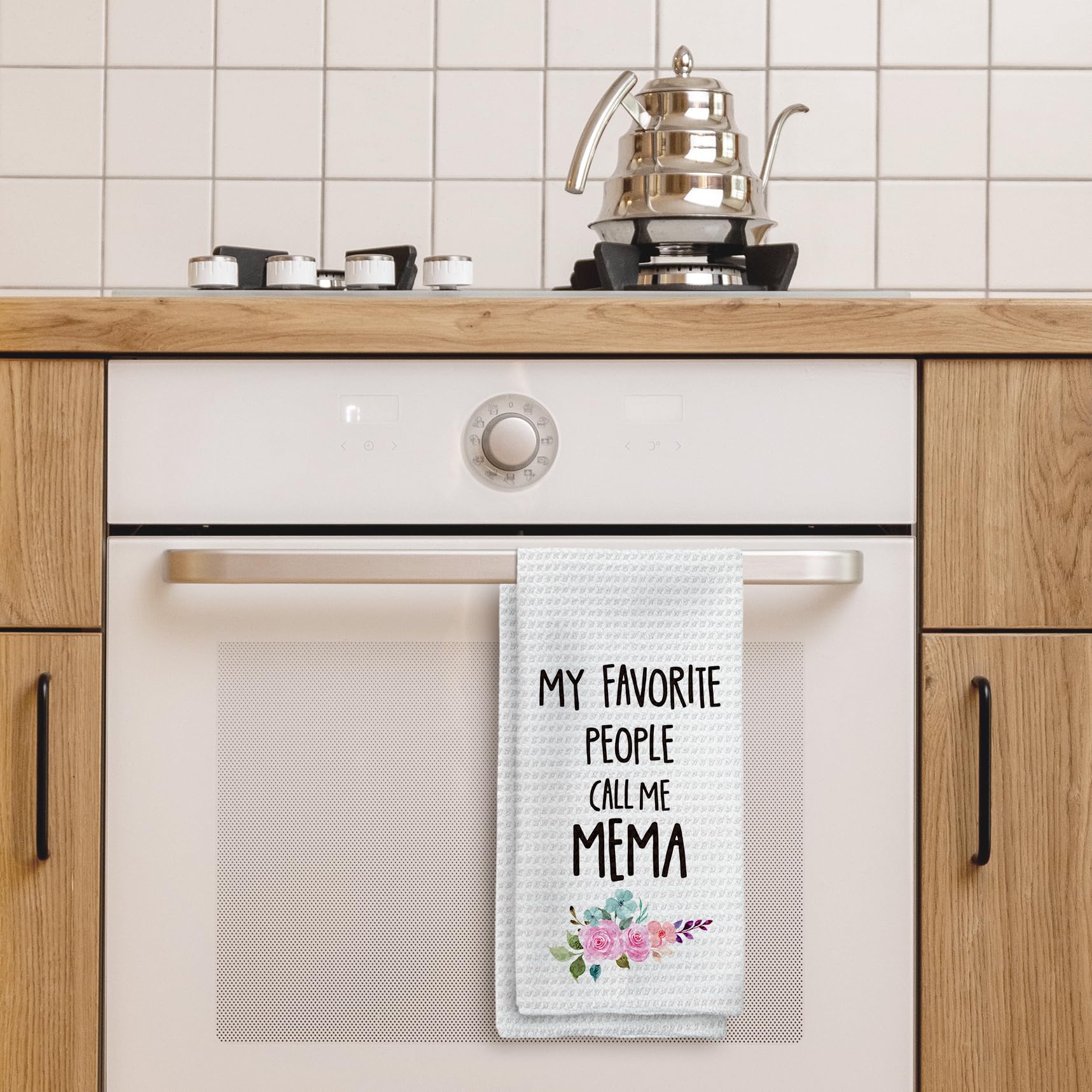 Tzhim Mema floral pattern towel adds cheerful style to daily tasks.