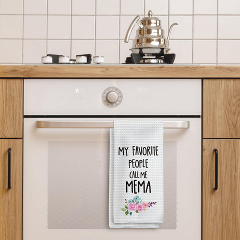 Tzhim Mema floral pattern towel adds cheerful style to daily tasks.