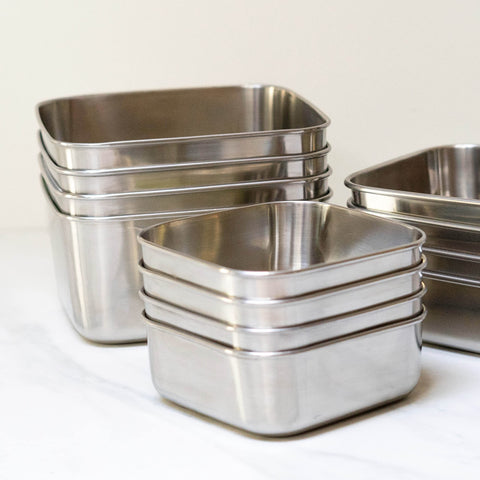 U Konserve space-saving nested design reducing fridge clutter.