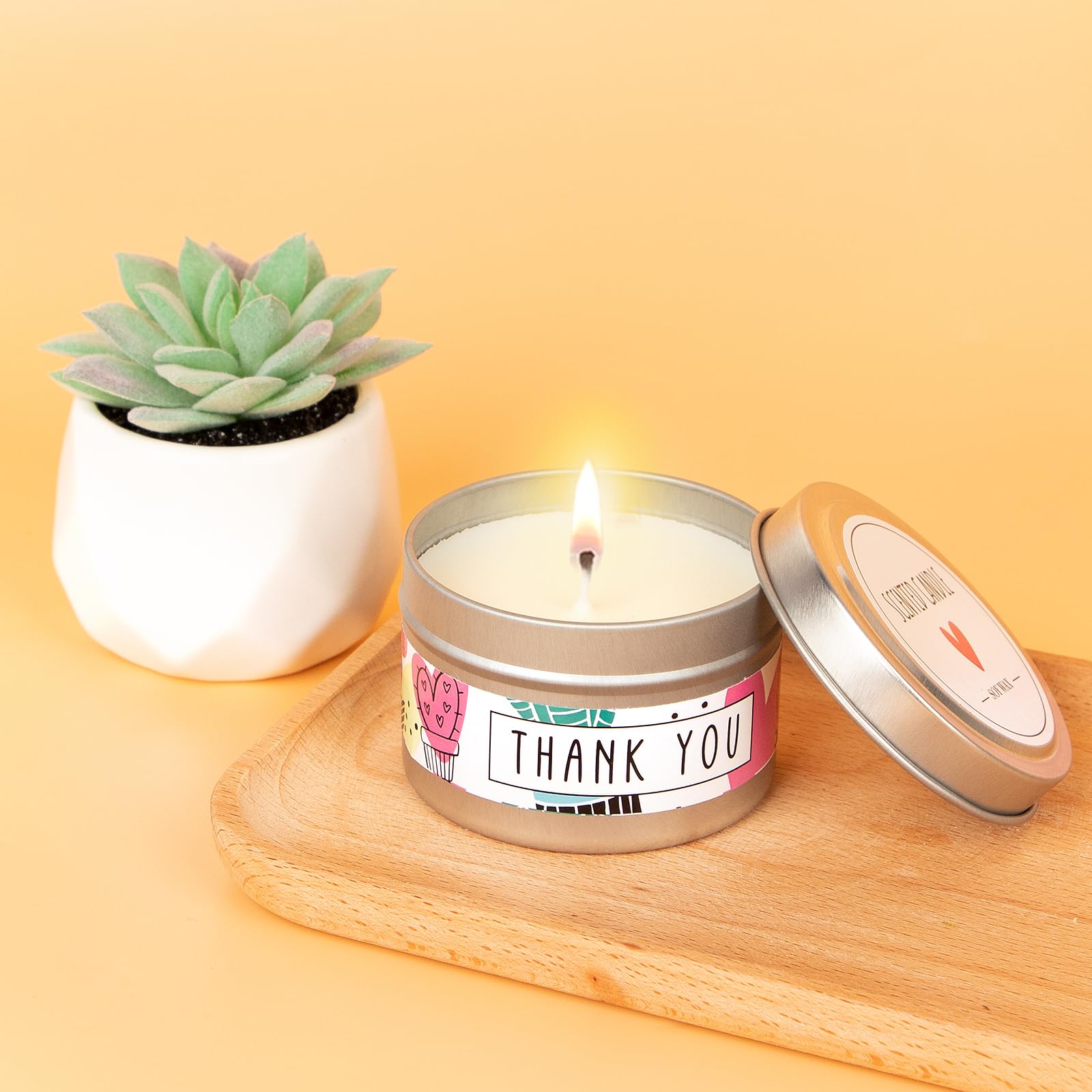 UAREHIBY scented candle creates calming desk ambiance.