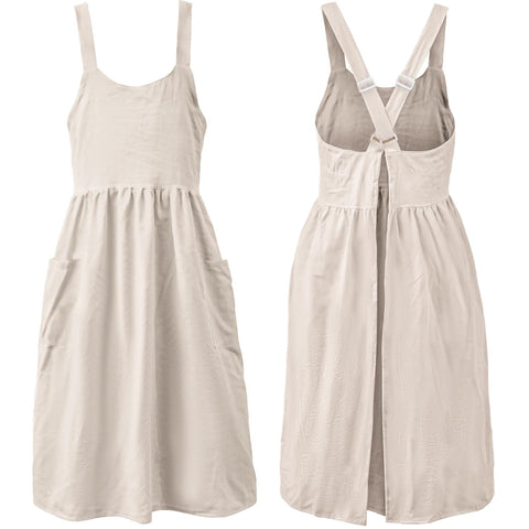 Uaussi cross-back apron on a model shows comfortable fit for long tasks.