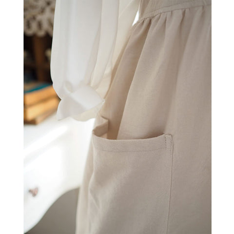 Uaussi cotton-linen fabric close-up reveals breathable, durable texture.