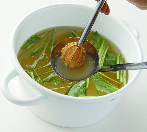 Rounded head design of UchiCook whisk enhances airy mixing.